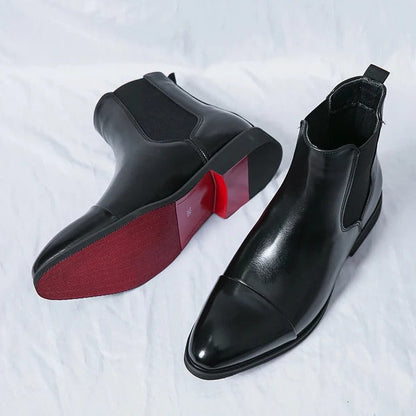 Men's black Chelsea boots with elastic side panels and sleek pull-on silhouette for everyday wear