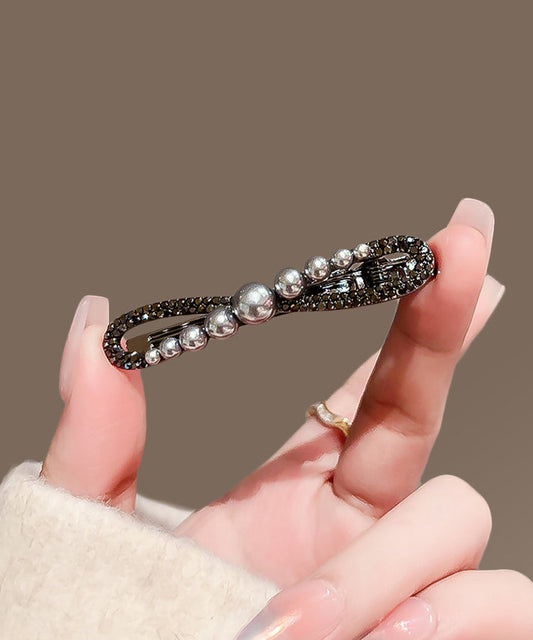 Épingle à cheveux chic en alliage de métal noir, zircon et perle, avec nœud papillon. - Wavlynn