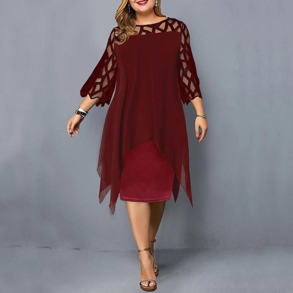 Black plus-size midi dress with elegant lace sleeves and round neckline for day-to-night wear