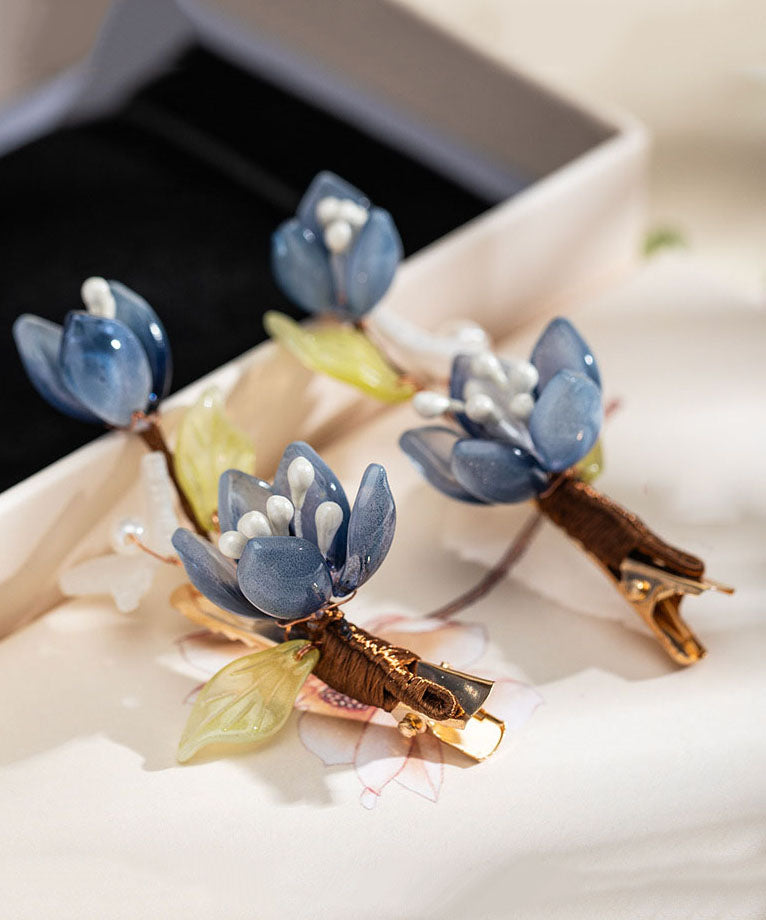 Paire d'épingles à cheveux lotus en cuivre bleu doré de style chinois, à glaçure nacrée. - Wavlynn