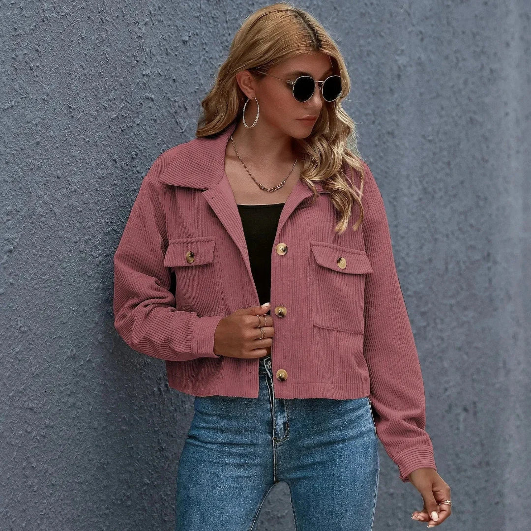 Cropped corduroy jacket in neutral tone with classic collar, oversized vintage-inspired silhouette