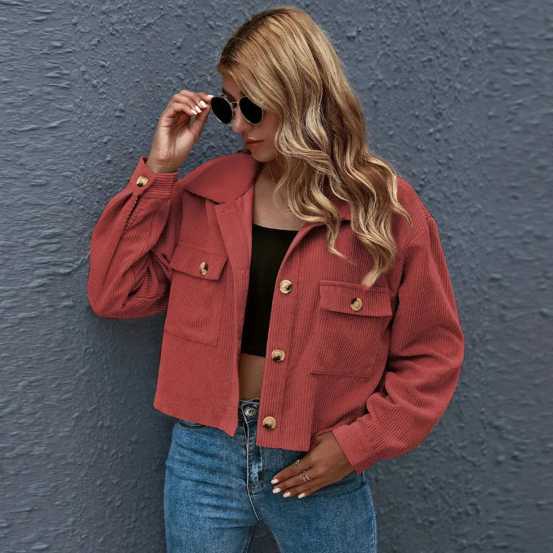 Cropped corduroy jacket in neutral tone with collar, loose oversized fit and vintage-inspired texture