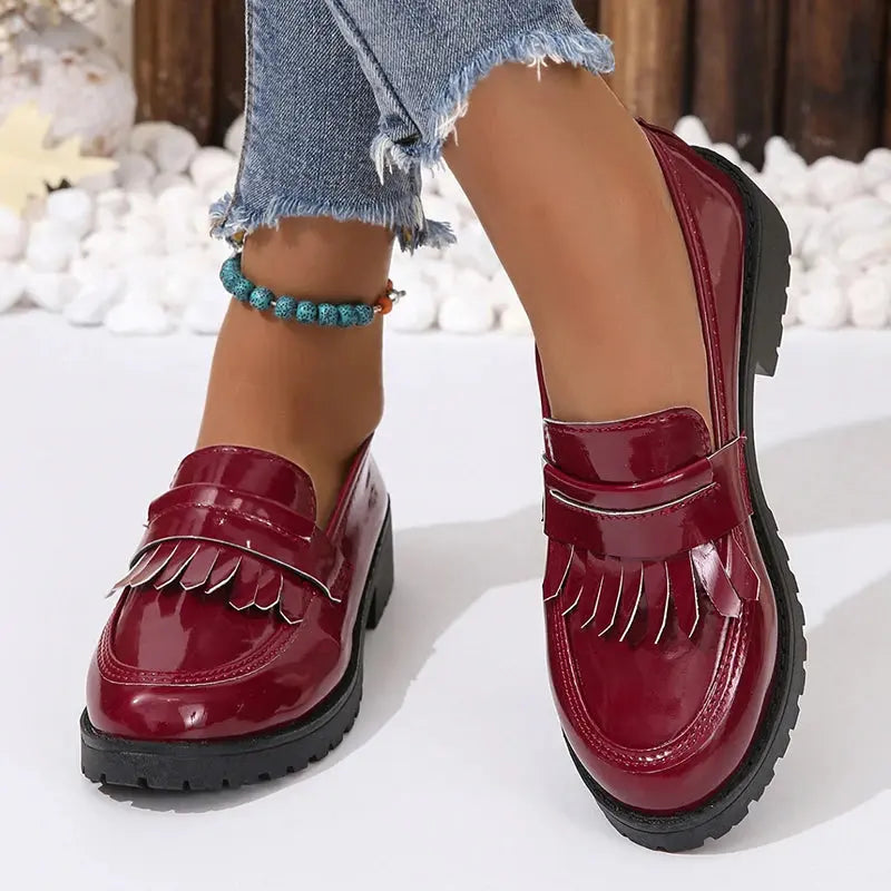 Black chunky loafers women slip-on with fringe tassel detail glossy polished finish retro style