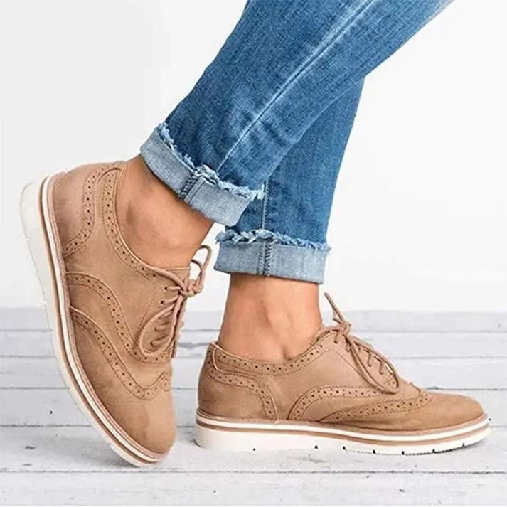 Women's classic brogue trainers with wingtip perforations, stylish versatile design for all-day comfort