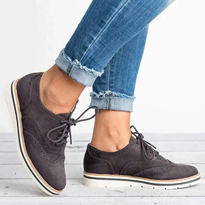 Women's classic brogue trainers with wingtip perforations, synthetic upper, versatile lace-up style
