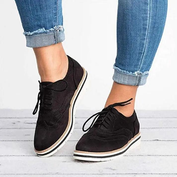 Women's classic brogue trainers in neutral tone, wingtip silhouette with decorative perforations