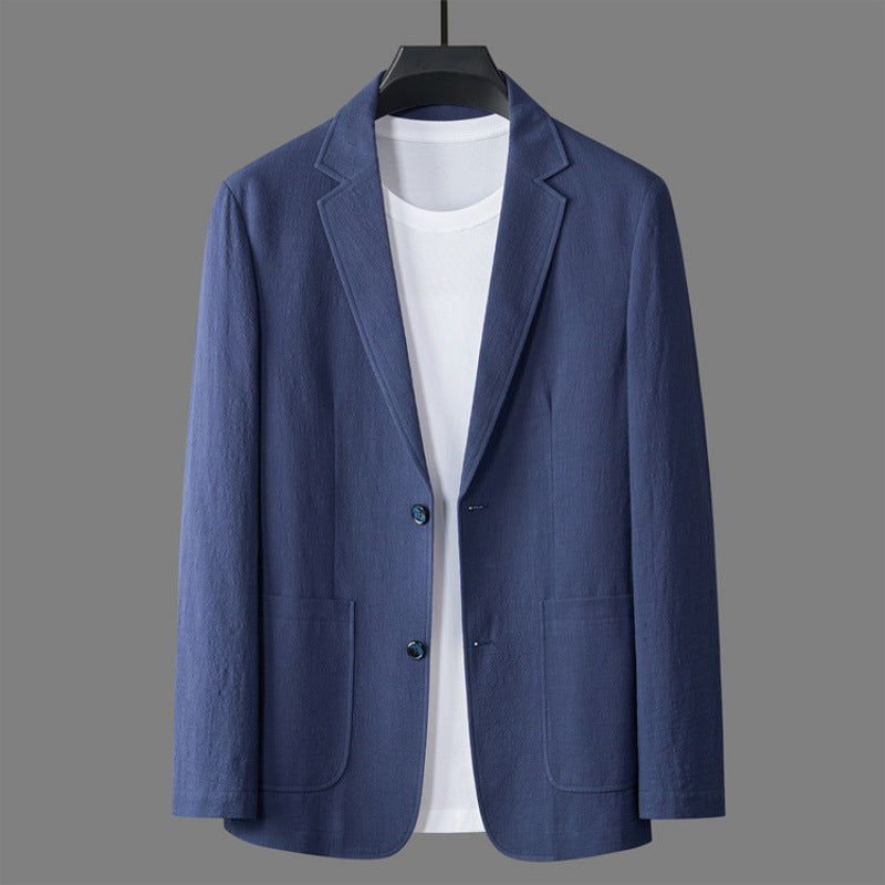 Relaxed-fit light beige linen blazer with casual drape and breathable lightweight fabric for warm days
