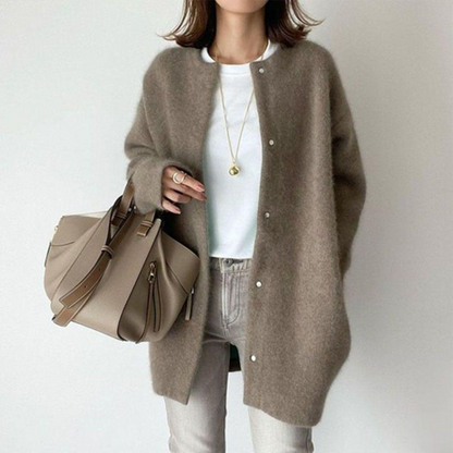 Riley refined layered cardigan in neutral tones, structured chic silhouette with dimensional knit layers