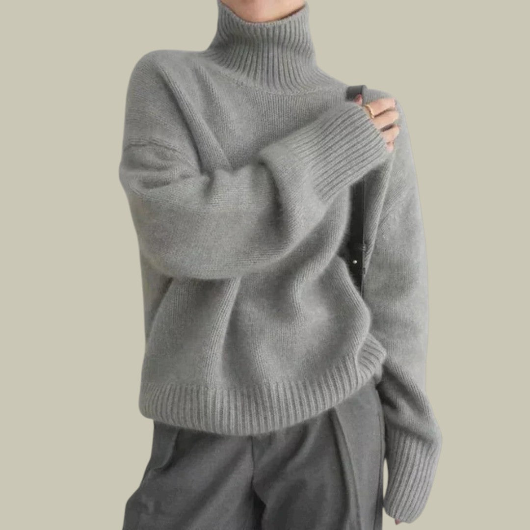 Women's ivory merino wool high neck relaxed fit sweater with elegant drape and cozy warmth