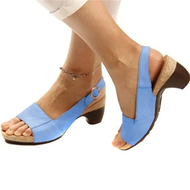 Women's beige open-toe slingback heels with elegant low heel and adjustable back strap