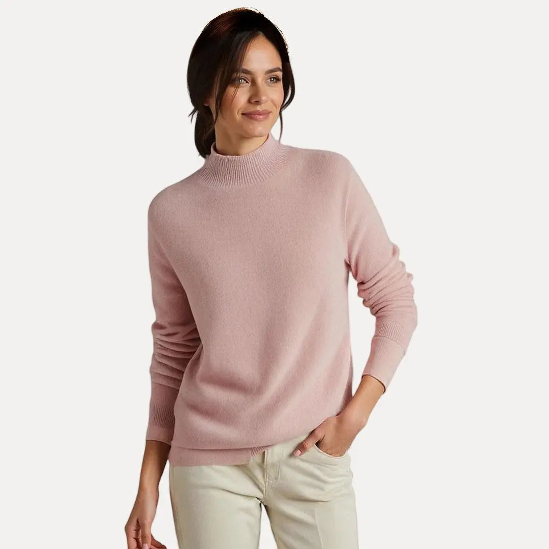 Coraline cream wool knit sweater with crew neckline, ribbed cuffs and hem for a structured fit