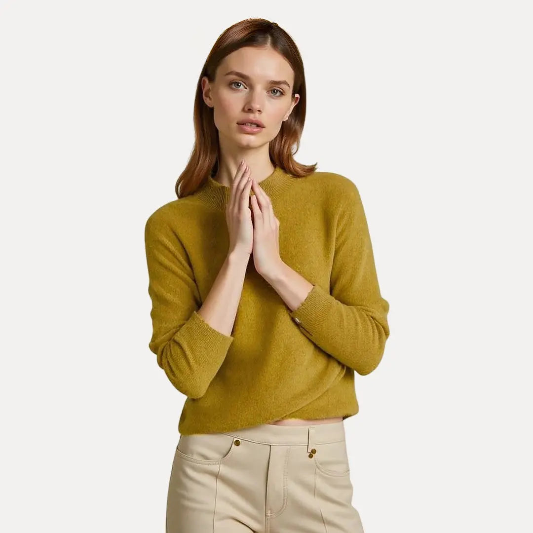 Coraline cream wool knit sweater with classic crew neckline, ribbed cuffs and structured hem fit