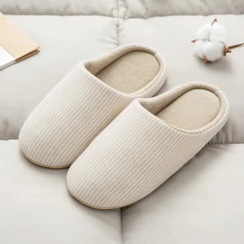 Women's cozy house slippers in warm tones with cushioned EVA sole and non-slip grip for indoor wear