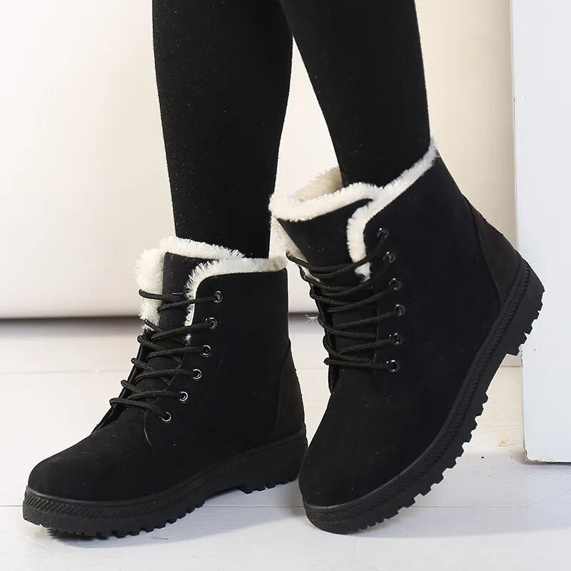 Women's short ankle boots in neutral tones, streamlined silhouette with warm plush interior lining