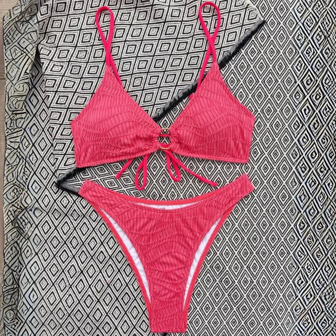 Crimson red textured triangle bikini set with ring-front detail and high-cut cheeky bottoms
