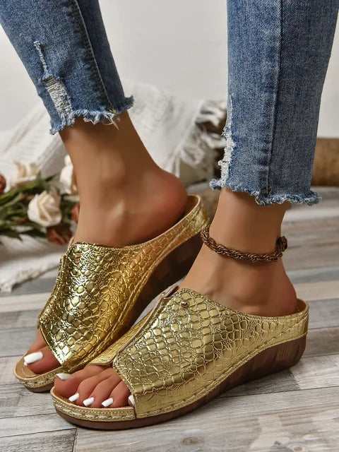Women's croc-embossed open-toe wedge sandals in neutral tone with textured upper