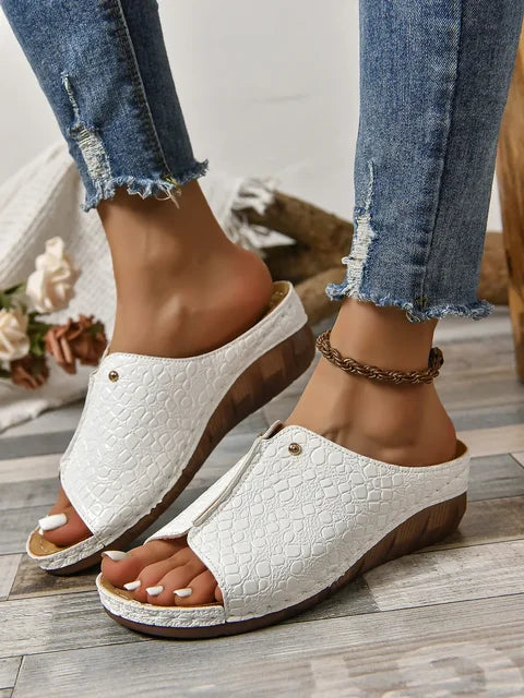 Women's croc-embossed open-toe wedge sandals in neutral tone with textured upper for everyday style