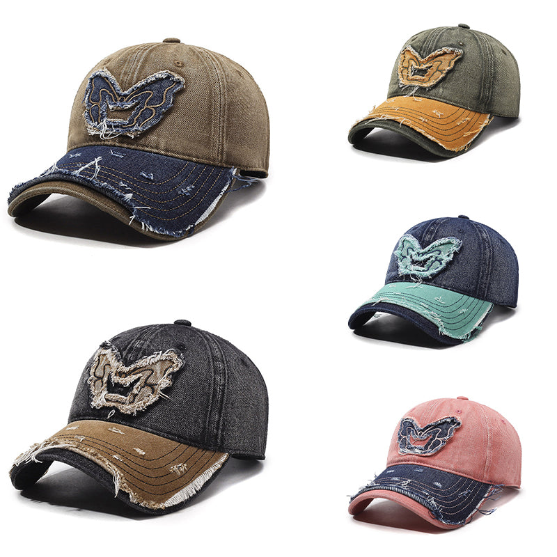 Washed denim baseball cap with embroidered butterfly accent, curved brim, retro streetwear style