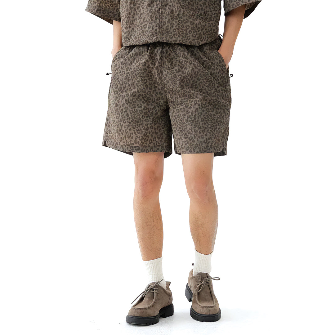 EchoTrek leopard print quick-dry nylon shorts with elastic drawstring waist, relaxed knee-length fit