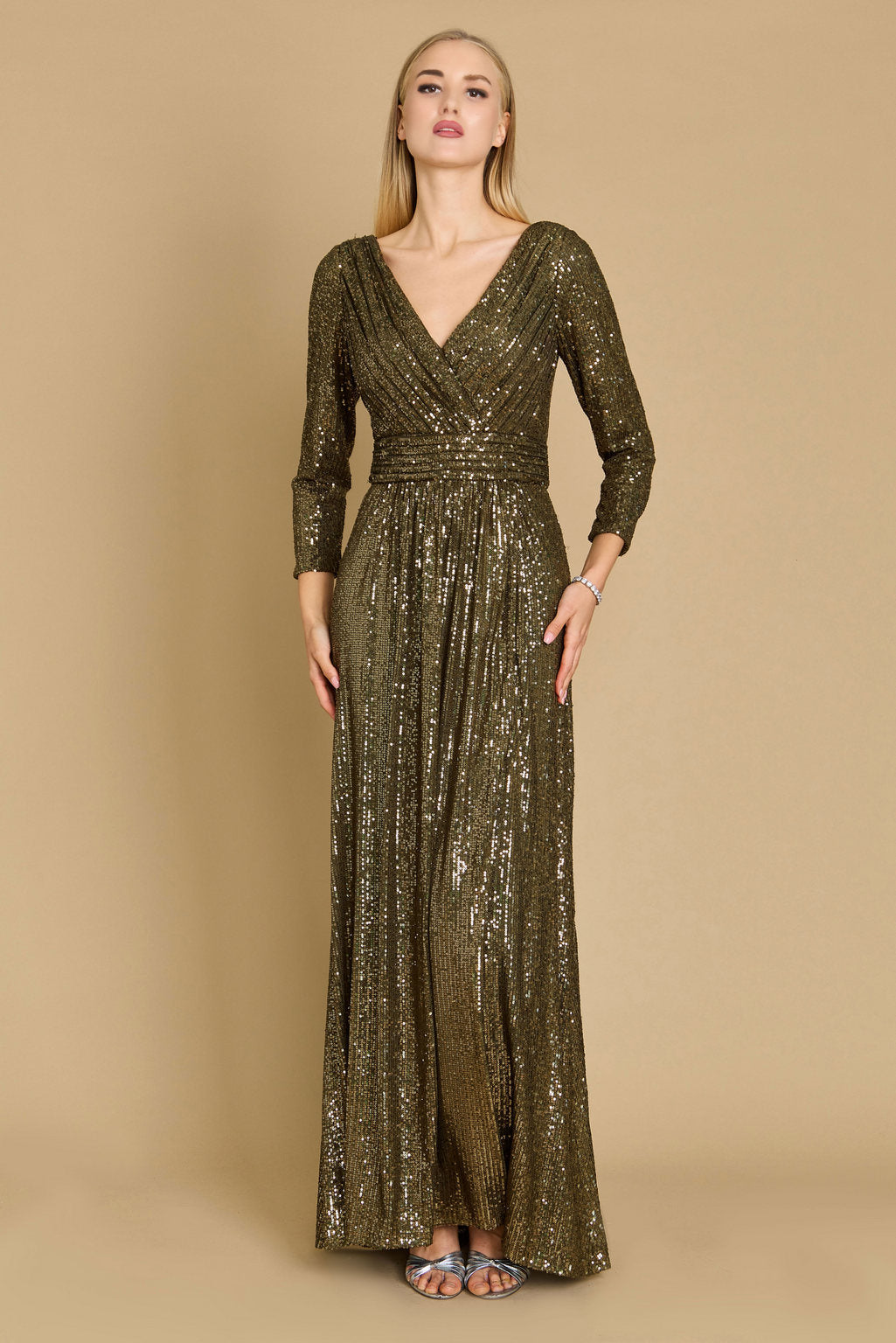 Floor-length long sleeve sequin prom gown with deep V-neckline and hand beaded embellishments