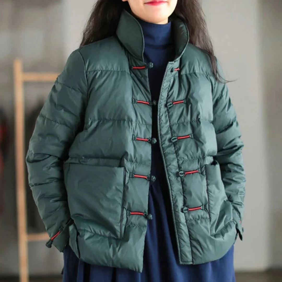 Black quilted down jacket with mandarin collar, knotted toggle closures and oversized patch pockets