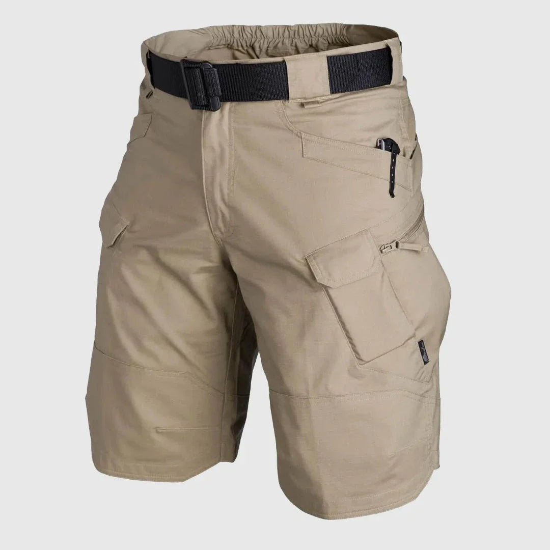Men's olive tactical cargo shorts with multi-pocket design, breathable cotton-polyester blend for outdoor travel