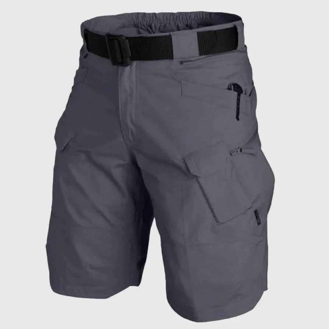Men's khaki tactical cargo shorts with multi-pocket design, durable cotton-polyester blend for outdoor travel