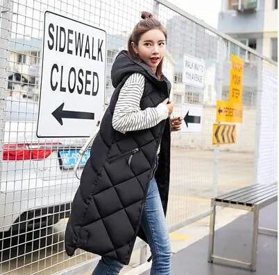 Women's long quilted hooded vest in winter tones, sleeveless diamond-pattern puffer silhouette for layering