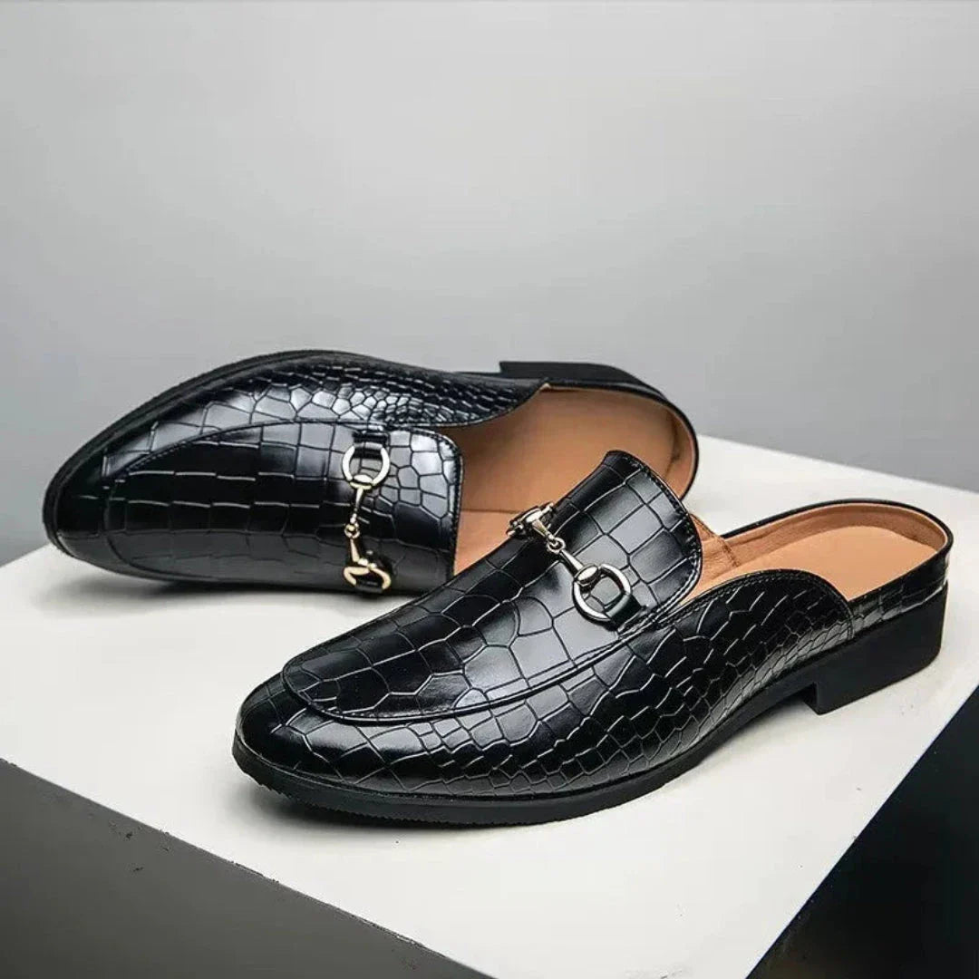 Dante croc-embossed faux leather backless mules with polished metal detail, slip-on style