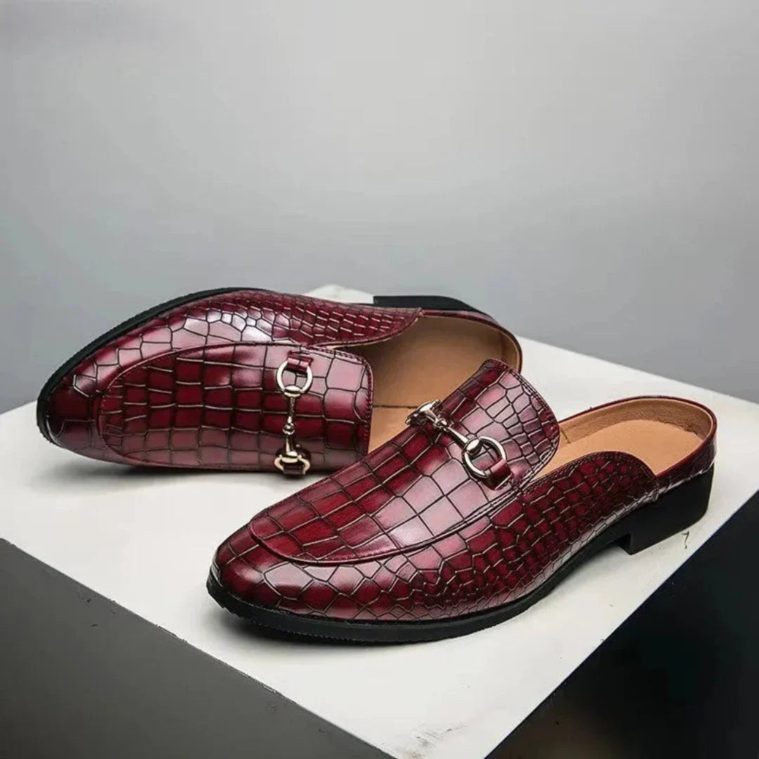Dante croc-embossed faux leather backless mules with polished metal detail, slip-on style