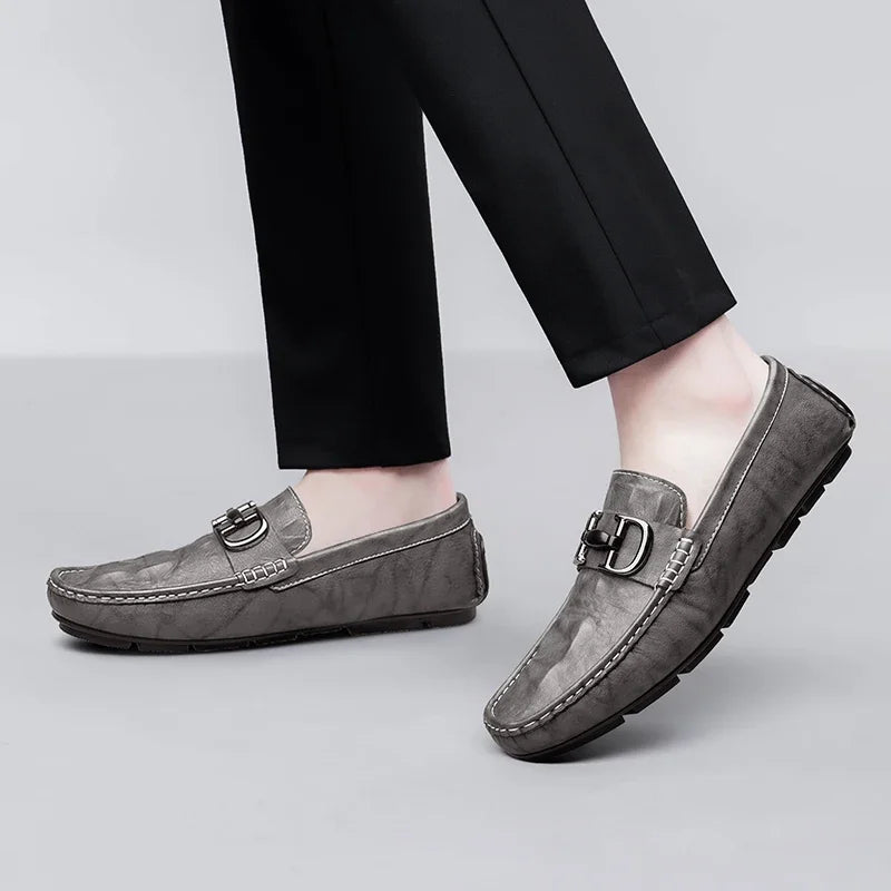 Dasio genuine leather loafers in polished finish with metal buckle detail and cushioned insole