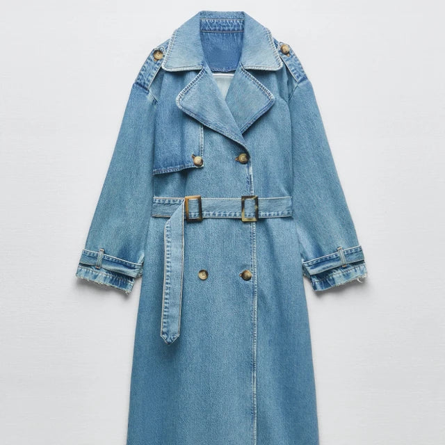 Women's amber denim longline trench coat with adjustable waist belt, structured polished silhouette