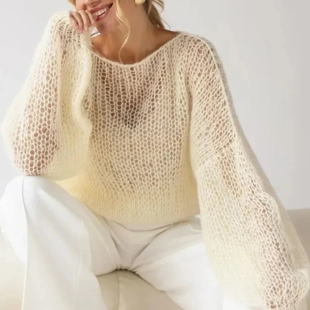 Ivory mohair-blend mesh sweater with dramatic lantern sleeves and open-knit breathable texture