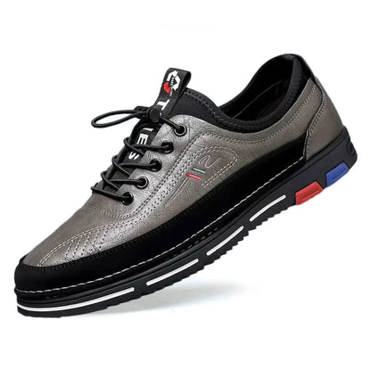 Derrick low-top faux leather sneakers with color-accented sole and cushioned lace-up design
