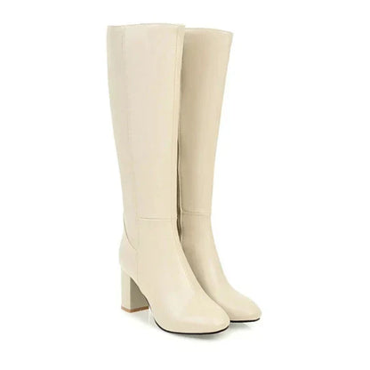 Women's black knee-high stiletto heeled boots with sleek tall shaft for a refined, leg-flattering silhouette