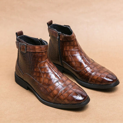 Black faux crocodile leather ankle boots with heritage buckle, zip closure, and stitched sole