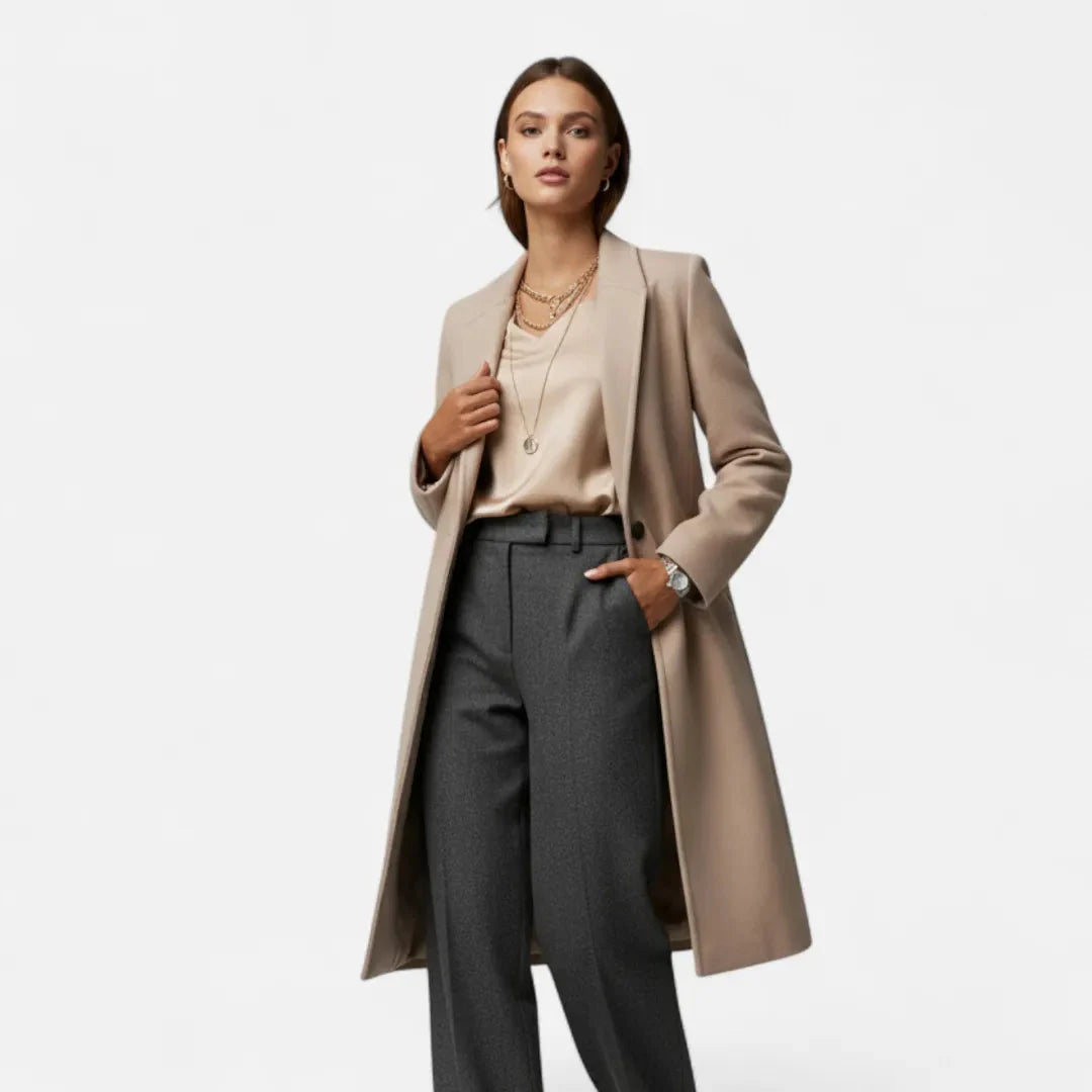 Women's longline wool blend overcoat in neutral tone with sharp lapel collar and single-button closure