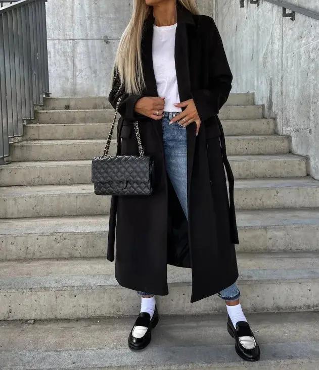 Women's double-breasted belted winter coat elegant silhouette waist-cinching design