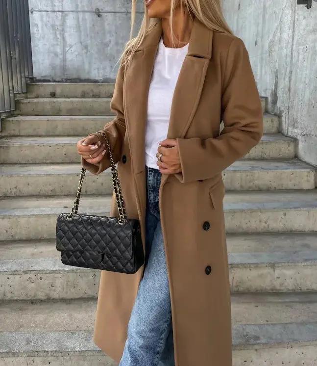 Women's double-breasted belted winter coat elegant waist-cinching silhouette in neutral tone