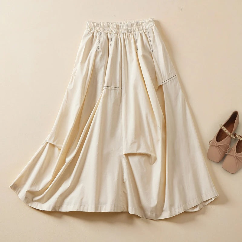 Driftwood beige linen-cotton blend drape skirt with sculptural silhouette and elastic waistband