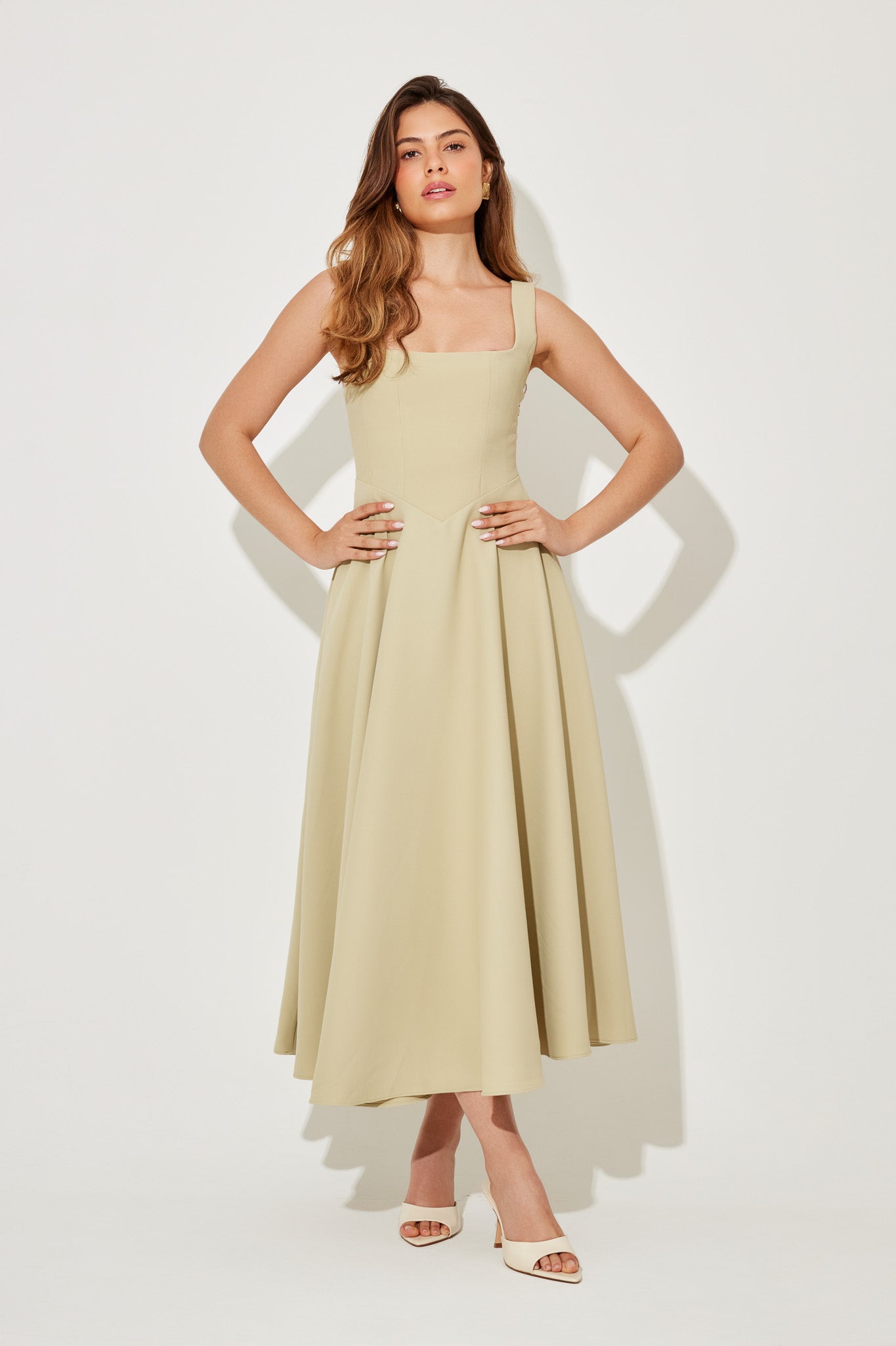 Flowy midi dress with square neckline, fitted waist, elegant silhouette for weddings and events