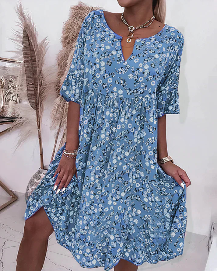 Women's elegant shift dress in a flattering silhouette with relaxed fit, perfect for cocktail occasions