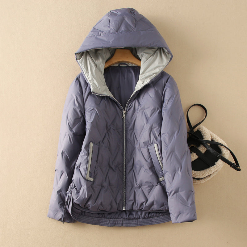 Women's quilted duck down jacket tailored fit with subtle fabric luster, warm insulated cold-weather coat
