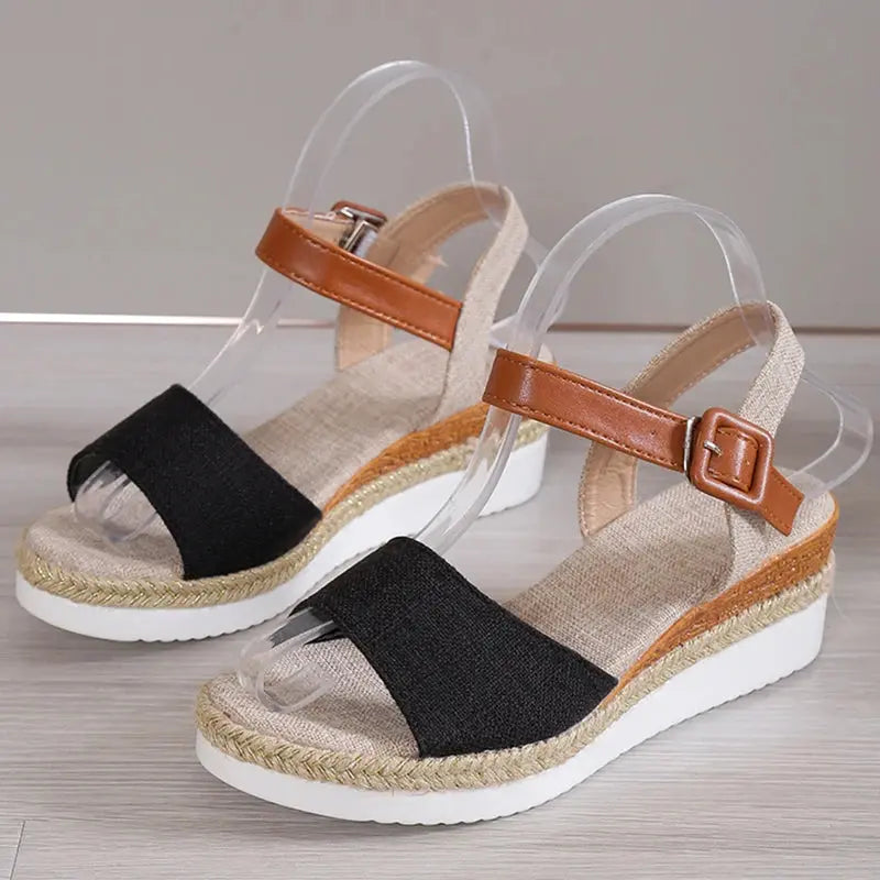 Women's elegant open-toe wedge sandals in neutral tone, stylish heel for summer comfort
