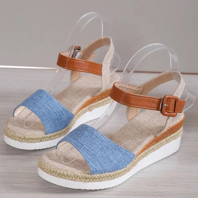 Women's elegant open-toe wedge sandals in neutral tone, stylish height boost for summer outfits