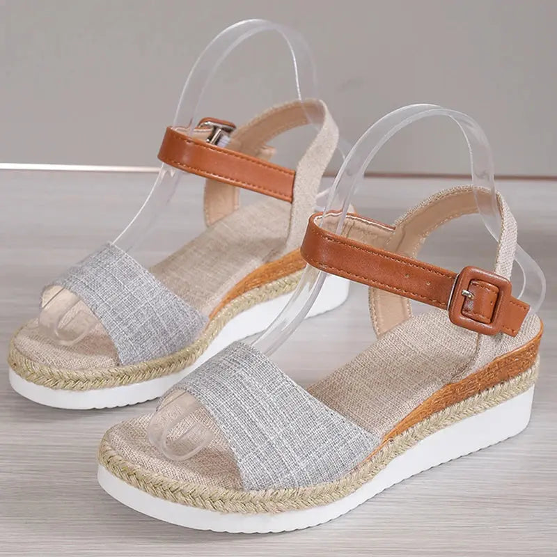 Women's elegant open-toe wedge sandals in neutral tones, stylish height boost for summer outfits