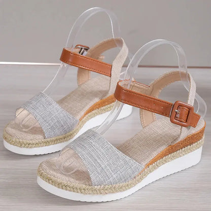 Women's elegant open-toe wedge sandals in neutral tones, stylish height boost for summer outfits