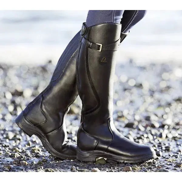 Women's black waterproof ankle riding boots with chic strap detail, elegant synthetic leather finish