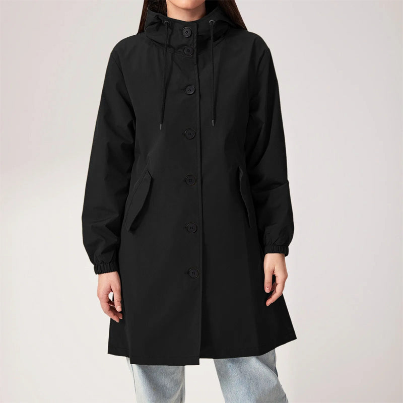Beige mid-length trench coat with classic lapels, belted waist, and rain-resistant polyester blend fabric