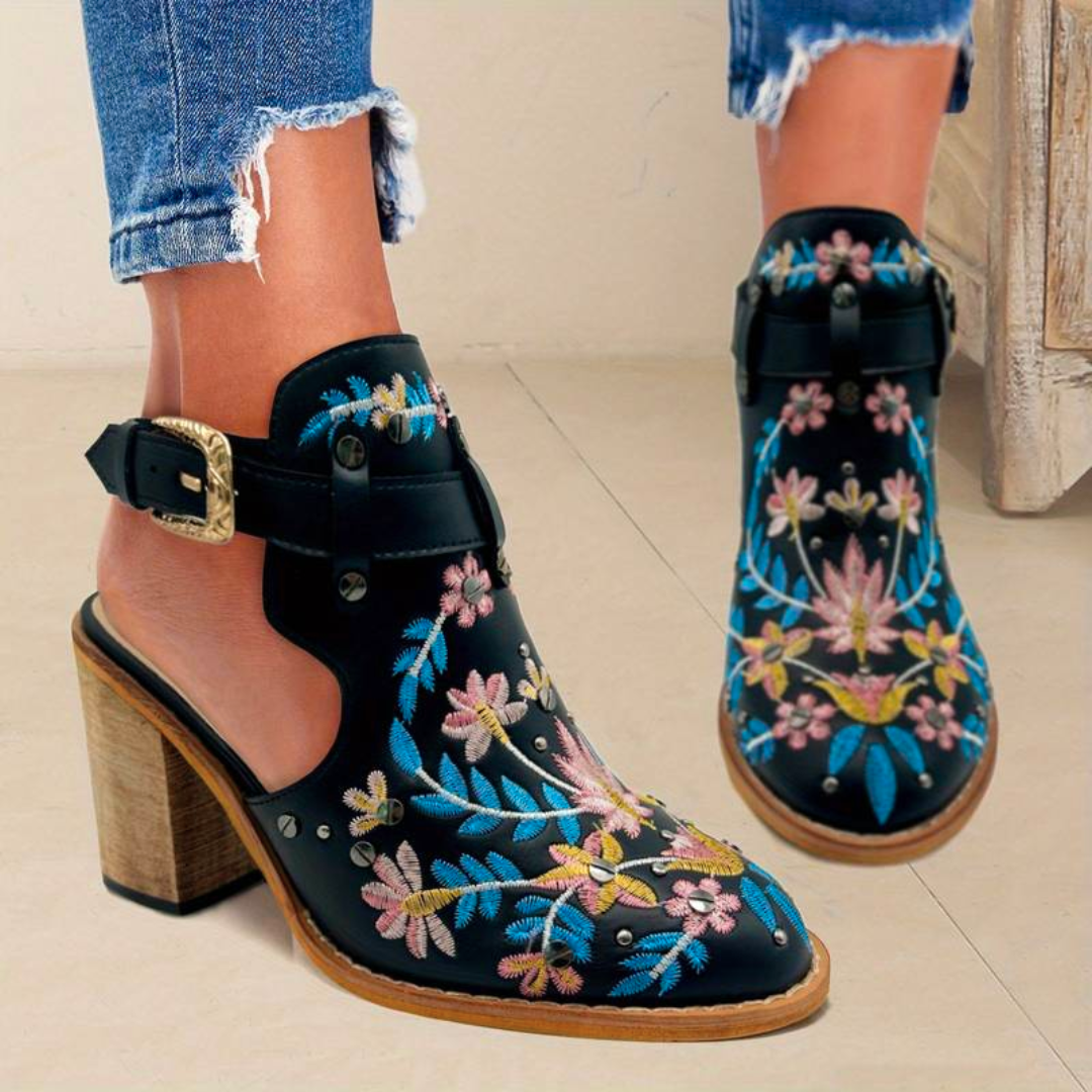 Women's tan leather ankle boots with intricate floral embroidery, chic Western style pointed toe